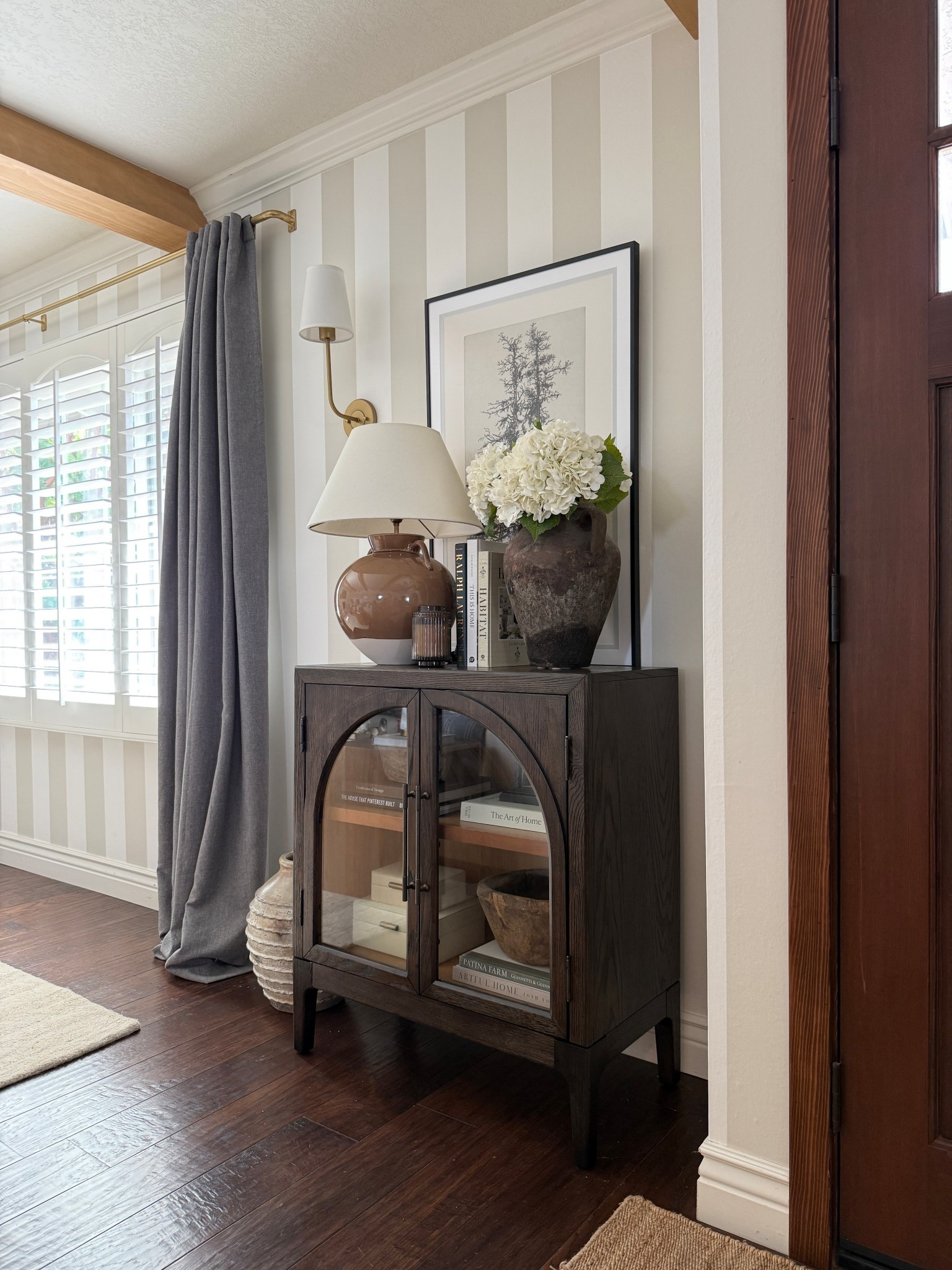 I love the arch design of this cabinet. So well made and fun to style for each season  

#LTKSaleAlert #LTKSeasonal #LTKHome