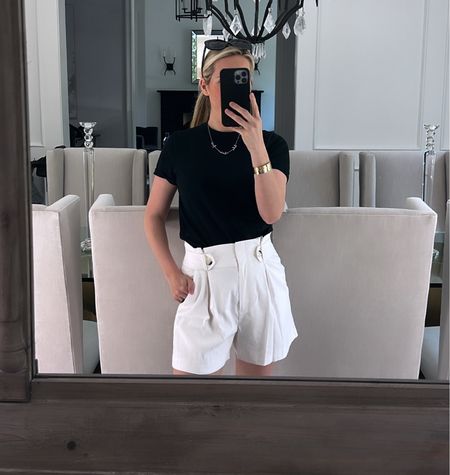 Wearing size 4 - white shorts 