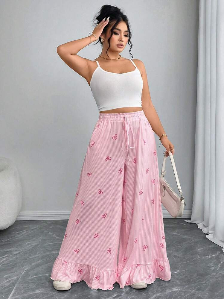 SHEIN Essnce Plus Size Loose Flare Leg Pants With Pink Heart And Ruffle Hem, Casual Comfort Style For Valentine's | SHEIN