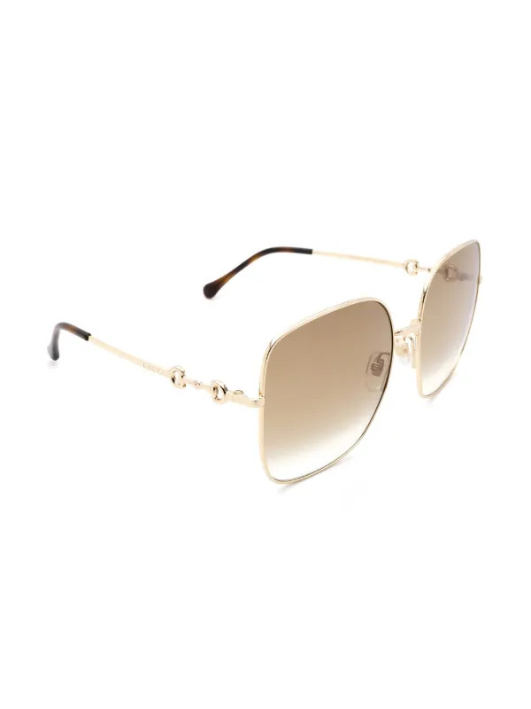 Gucci Eyewear horsebit-embellished Oversized Sunglasses | Gold | FARFETCH PT | Farfetch Global