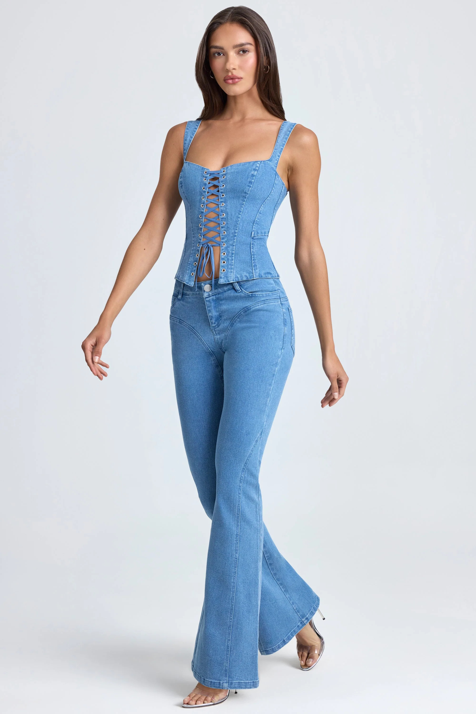 Mid-Rise Flared Jeans in Mid Blue Stonewash | Oh Polly