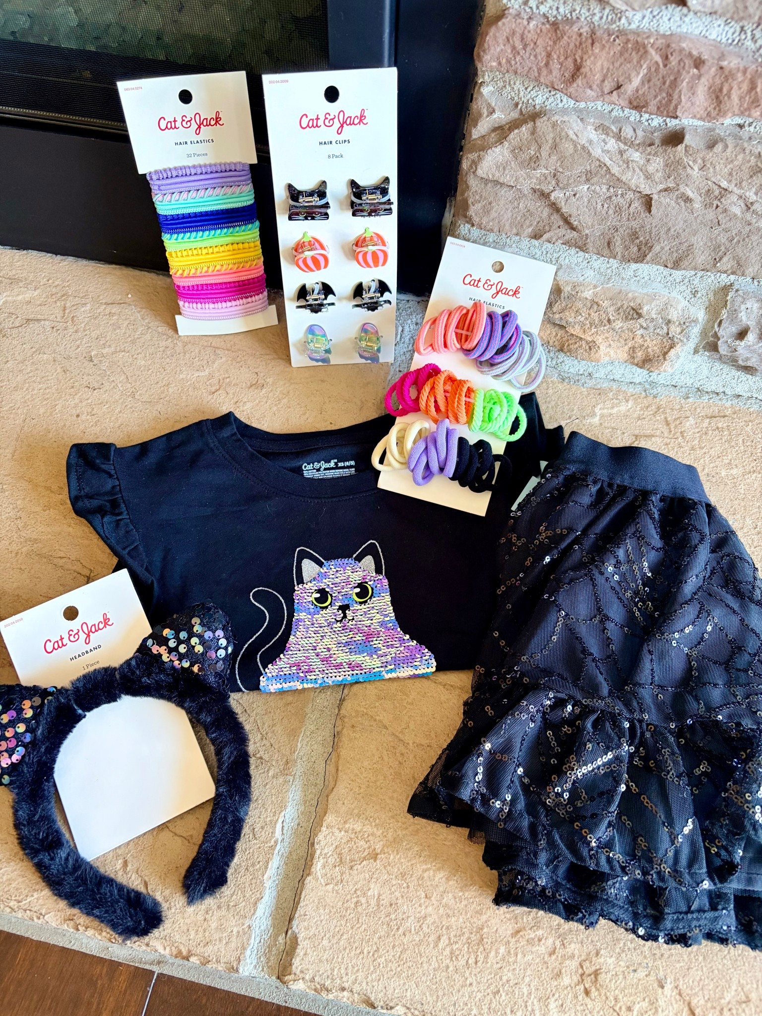 We grabbed this girls Target Halloween outfit for dance class 🖤🐾 The black cat + ghost shirt paired with a sparkly sequin skirt is such a fun look, and the kitty ears + hair ties make it extra festive. Perfect for school parties, trick-or-treating, or any fall celebration! 🎃👻✨
Cat + Jack Targett

#LTKSeasonal #LTKKids #LTKHalloween