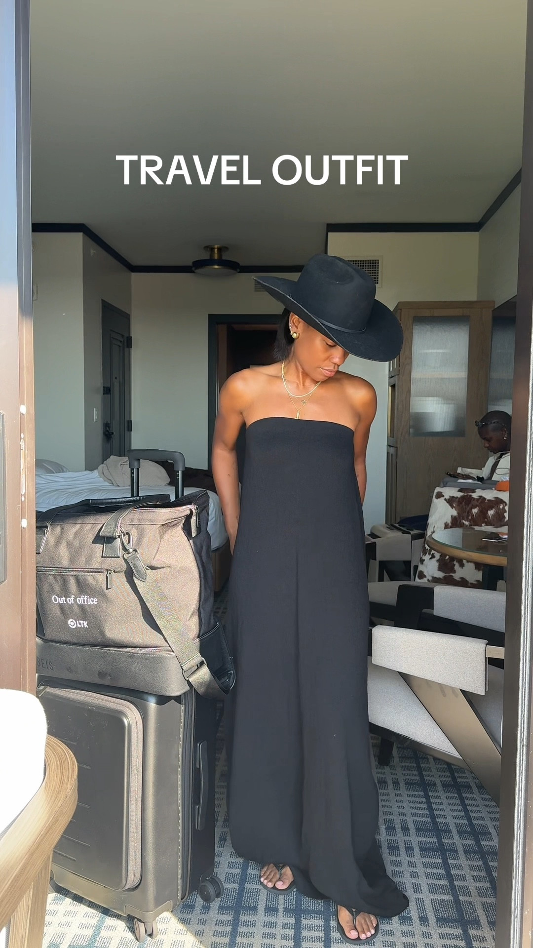 Shay's all black travel outfit: black maxi dress, cowboy hat, black carry on suitcase (great price) and Beis luggage 

#LTKStyleTip #LTKTravel #LTKPetite