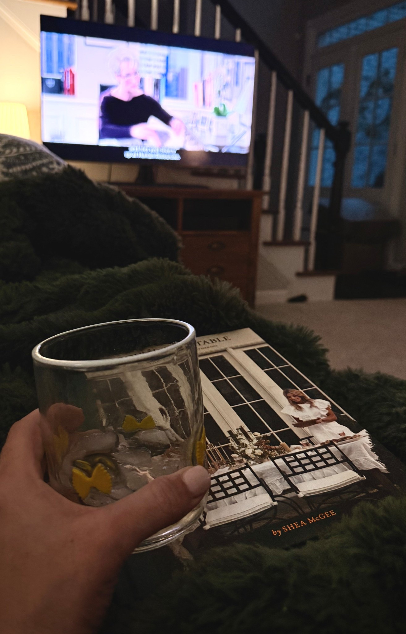 Saturday nights done right ✨
A little @Winc wine, TDWP1 on the TV, and finally flipping through Shea McGee’s new cookbook 🤎 
The @Anthropologie icon glass is one of those small upgrades that makes even a simple drink feel luxe.
And this green blanket? Still my favorite thing I bought all winter.

Exactly what I needed!

Linked everything ✨👇🏼

#LTKHome #LTKMothersDay #LTKOver40