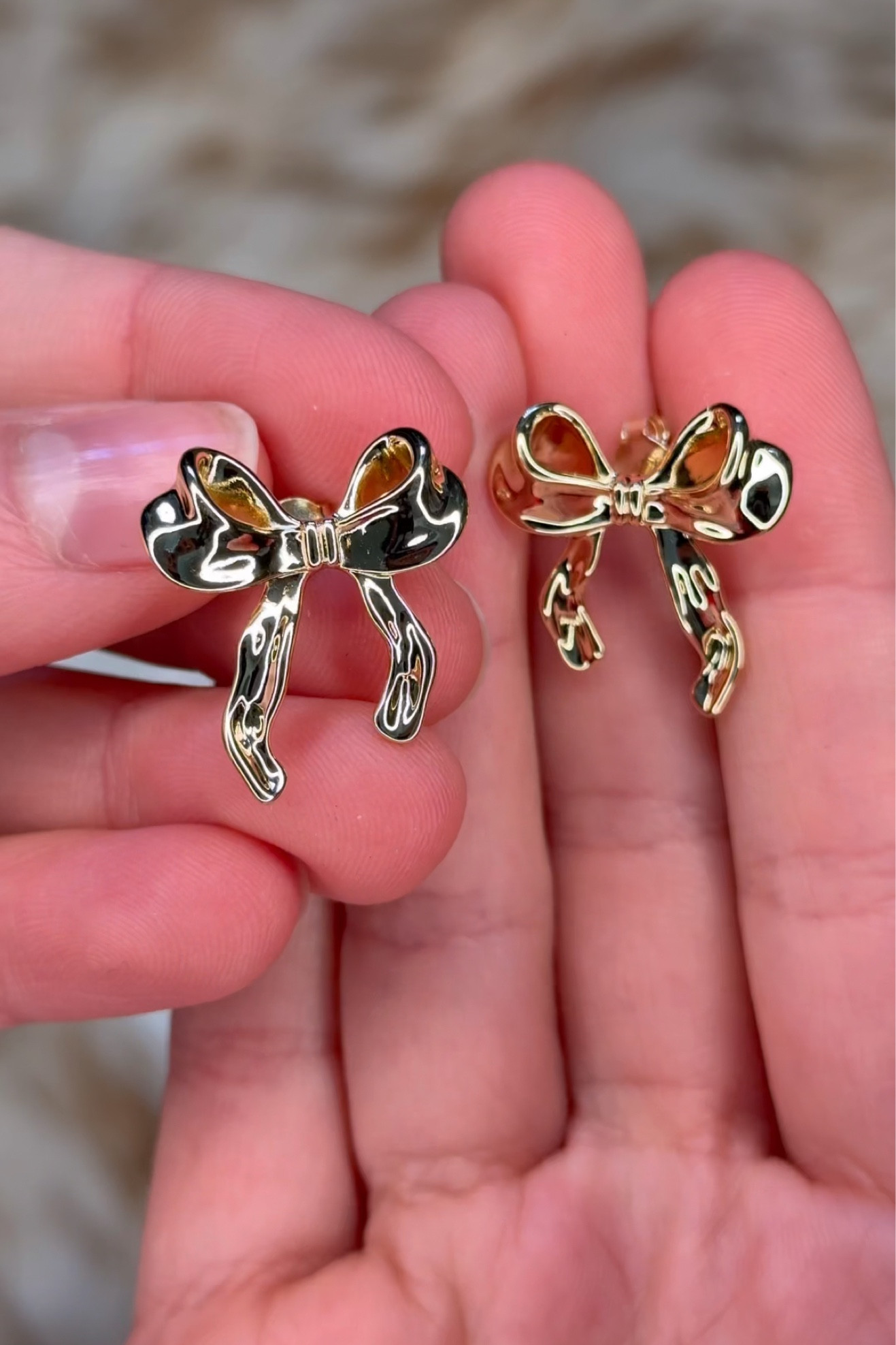 Bows are in. Lean into the coquette era in these cute 14K yellow gold-plated bow-shaped studs that are 20.8mm x 22.8mm.
Always crafted with care, the earrings feature a durable finish that's 100% nickel-free, cadmium-free, lead-free, and hypoallergenic. So it's safe for sensitive skin and all-day, everyday wear.

#LTKFindsUnder50 #LTKMostLoved
