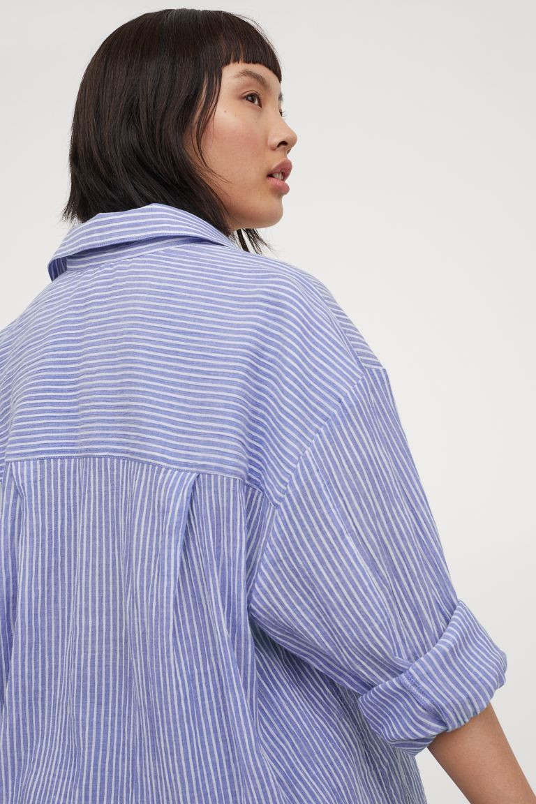 Shirt in an airy cotton weave with a collar and buttons down the front. Relaxed fit with shoulder... | H&M (UK, MY, IN, SG, PH, TW, HK)