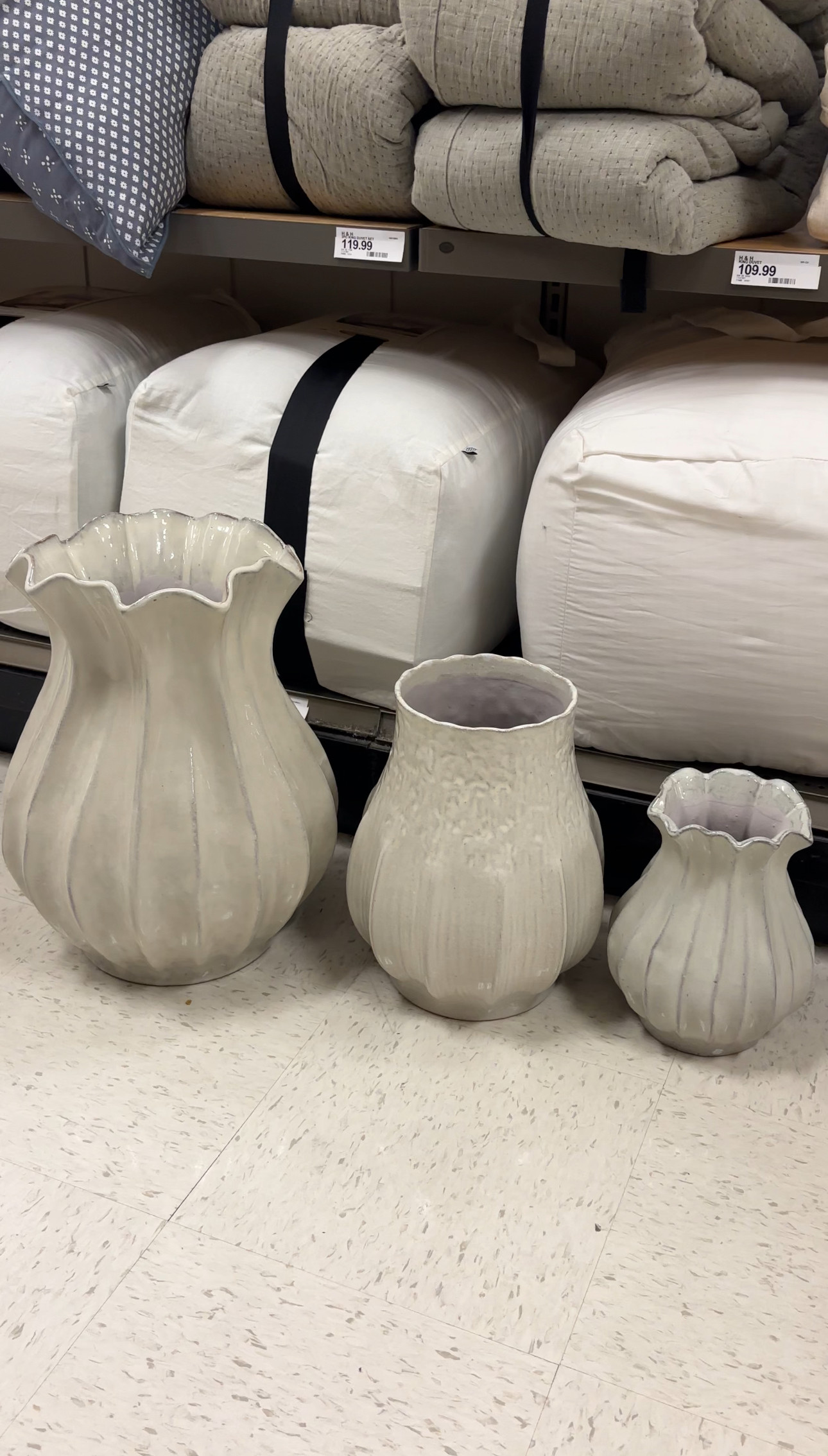 These pleated ceramic vases from Hearth & Hand with Magnolia come in three different sizes, and they look SO good styled together. 🎯 They're similar enough to create a collected, cohesive look, but the different shapes and heights add the perfect amount of interest and dimension.
I love them grouped on a console table, dining table, mantel, or open shelving—and that soft, creamy neutral finish works beautifully with modern organic decor.
If you're looking for Target home decor, Hearth & Hand decor, modern organic decor, neutral vases, ceramic vases, decorative vases, console table decor, mantel decor, shelf styling, designer-inspired home decor, affordable home decor, or budget decorating finds, I've linked all three vase sizes here! 🤍 

 #LTKHome #LTKSaleAlert
