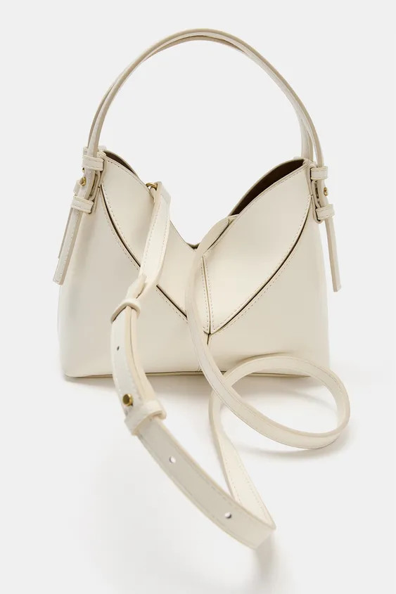 Mini bucket bag. Handle and detachable crossbody strap. Contrast seam detail. Detachable interior... | Zara US