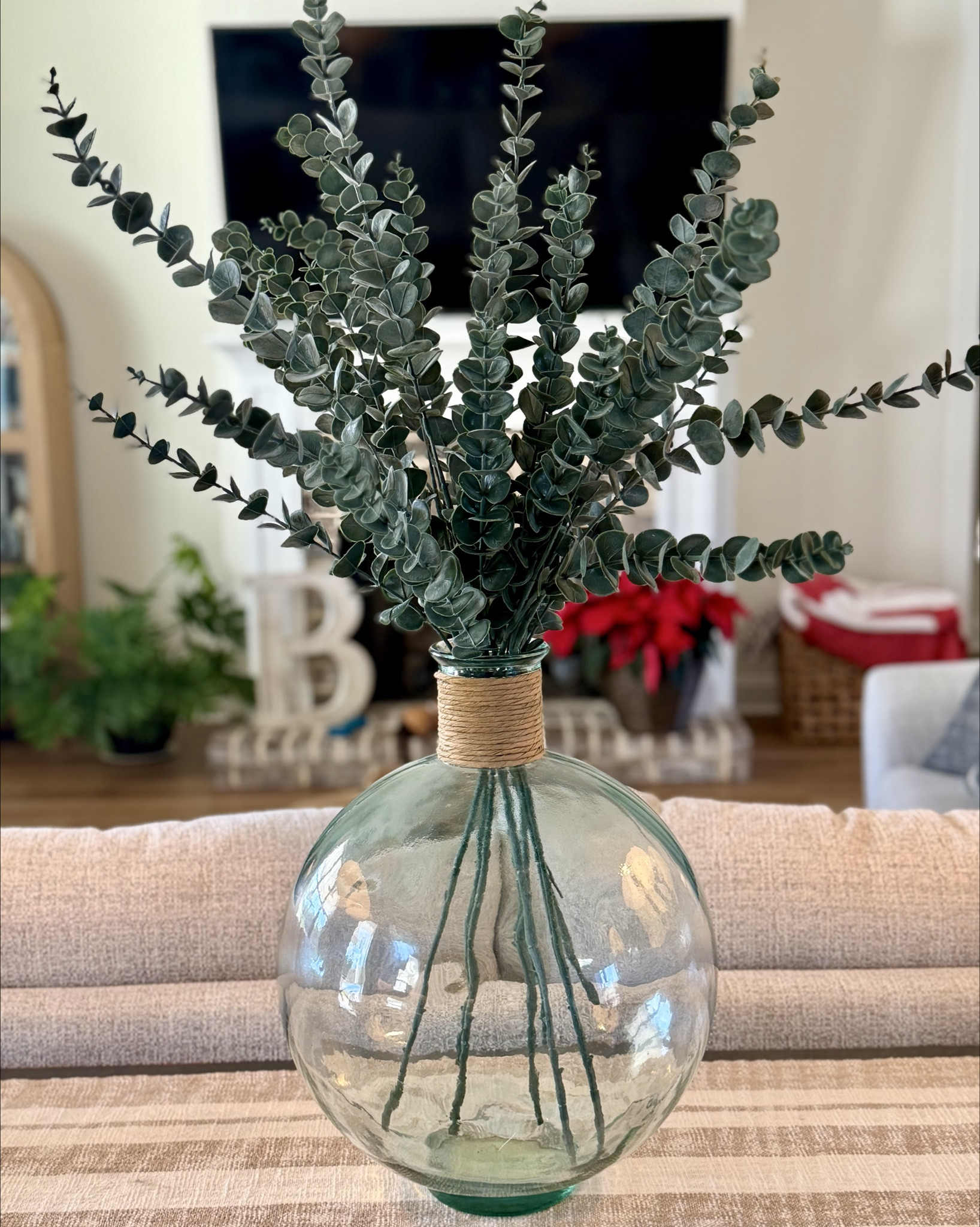 Pottery Barn look on a @walmart budget! Grabbed these stems to refresh my sofa table decor. They look much higher quality than their $8 price tag! Swipe for a close up👀 My vase is old but I linked some beautiful, similar ones from @wayfair 