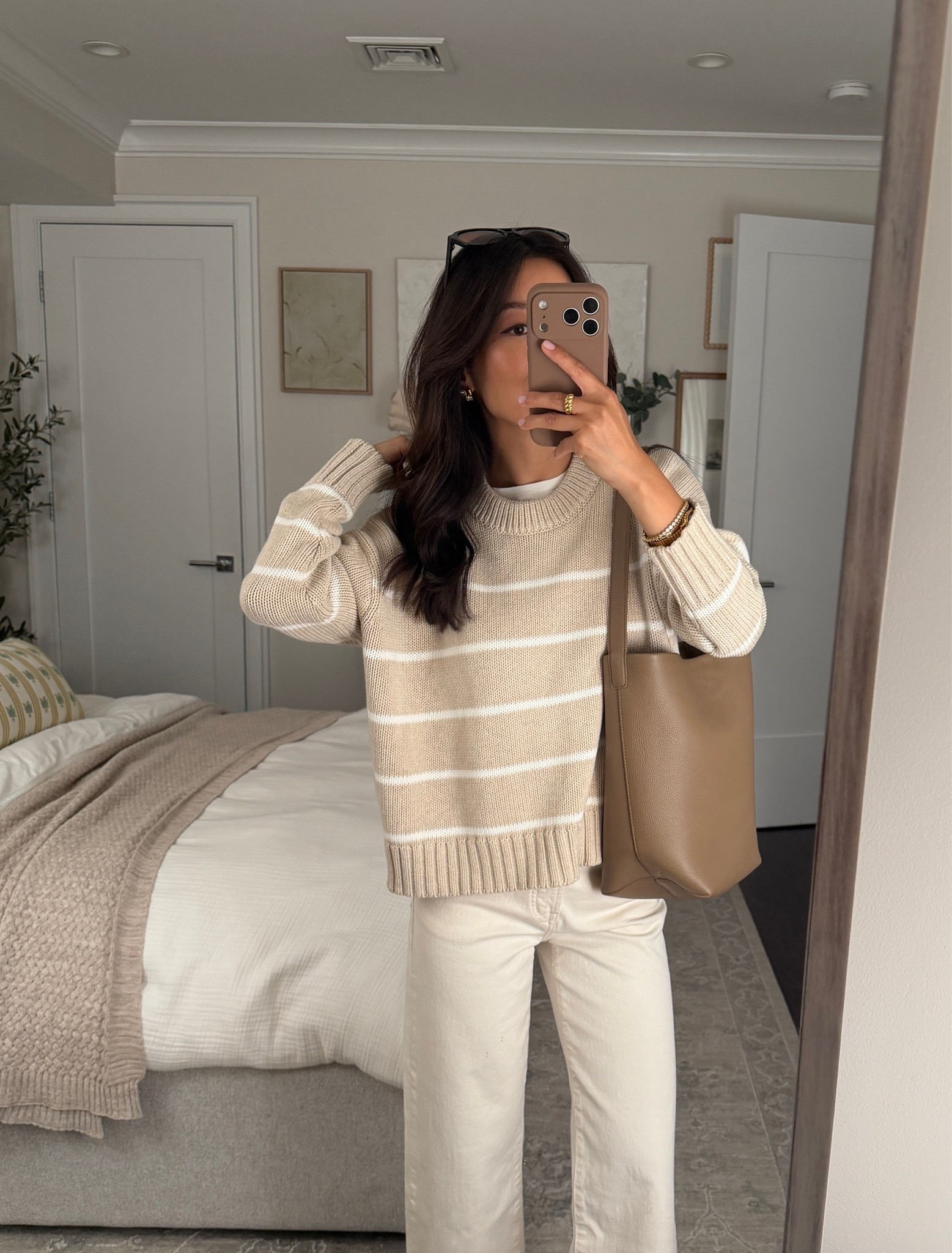 Size info below! • Quince bucket tote, smaller option is a nice size for petites, has a zippered pouch inside 
• Classic 100% cotton striped sweater XS, relaxed wider fit. 

Petite friendly, transitional outfit, easy mom outfit, shoulder bag
@Quince #quincepartner 

#LTKPetite #LTKootd #LTKmomlife