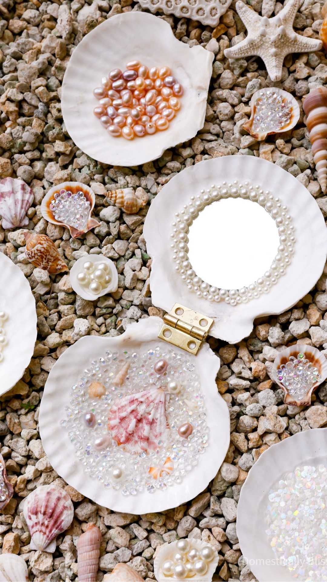 This DIY Mermaid Seashell Compact is the most fun beach craft that you can enjoy using all summer long for years to come.
As I was making this seashell pocket mirror, I decided to make a whole array of beach and shell items for my baby girl to play with when she is older.
I plan to make a shell box and put all my homemade seashell treasures in it, and then gift it to her in a few years.
So far, I have this mermaid makeup mirror and some handmade seashell hairpins.
I think my next project will be a hairbrush to go with her growing collection of seashell accessories!
Will you be making a DIY Mermaid Seashell Compact this summer?
ps. This would make such a fun project for a craft night or on a rainy beach day! 

See details:
https://domesticallyblissful.com/diy-mermaid-seashell-compact-mirror/



#LTKWedding #LTKSeasonal #LTKTravel