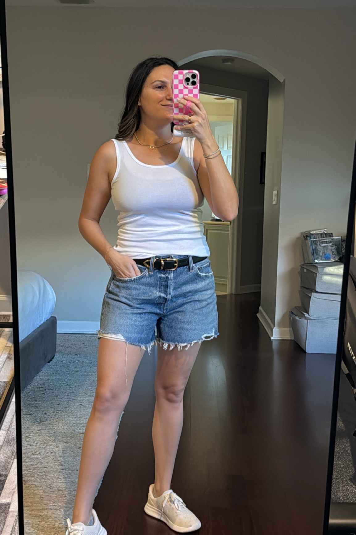 Sunshine ready! A comfy white tank, classic denim jean shorts, sleek belt, and comfy sneakers for a day in the sun! 

#LTKtravel #LTKstyletip