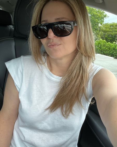 Quick pick in my car of my white muscle tee and sunglasses. The tee has a slight extended cap sleeve and my sunglasses are a flat top round rectangular shape.

#LTKxMadewell #LTKsalealert #LTKstyletip