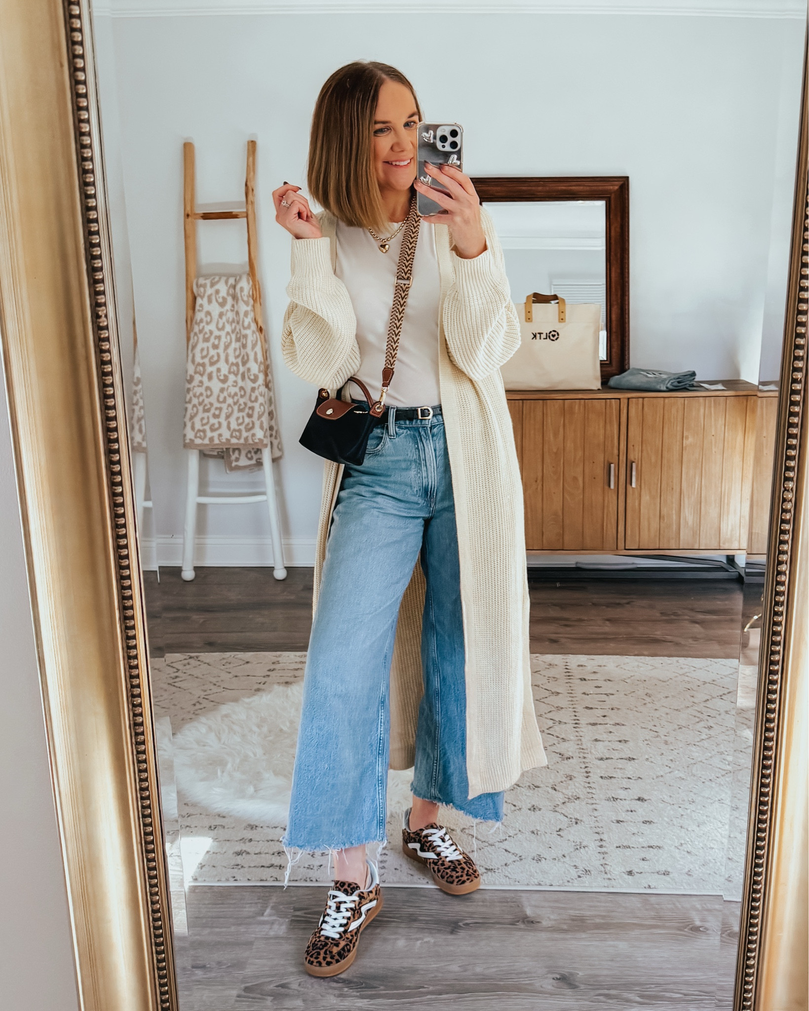Casual everyday outfit
Duster cardigan medium 
Wide leg crop jeans tts
Leopard sneakers on sale and tts
Amazon mini le Lage tote

#LTKSeasonal #LTKOver40 #LTKStyleTip