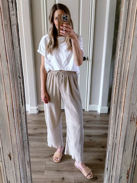 Breezy, crinkle textured pants that are perfect for summer! I’m 5’5” and wearing the Small Short for a more cropped look. 

Travel Outfit, Sandals, Summer Outfit, Beach Vacation, Swimsuit Cover Ups, White Tee, Summer Pants, Memorial Day, Fourth of July

#LTKshoecrush #LTKFind #LTKstyletip