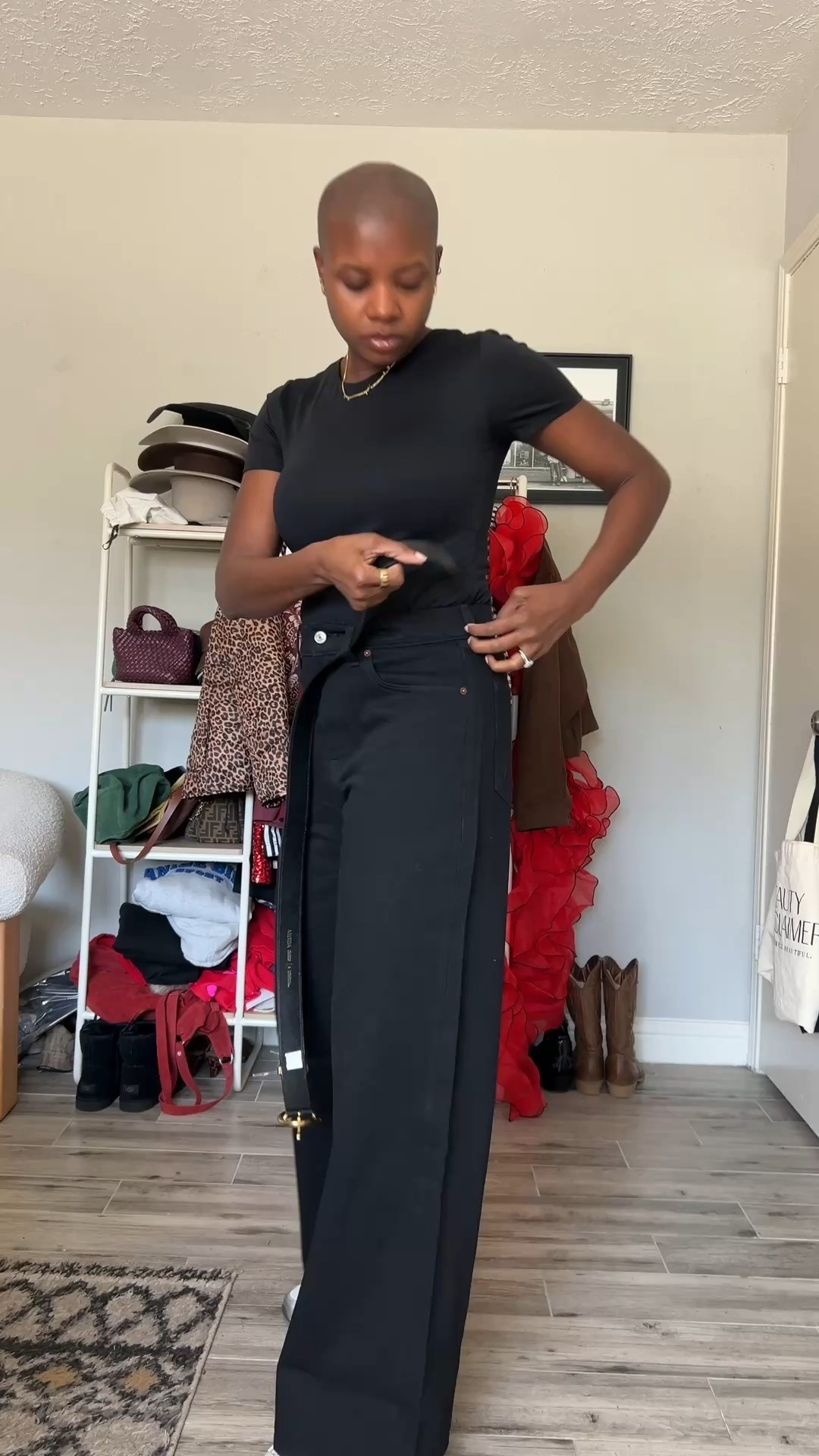 3 jackets that make the outfit better! Black spanx tee, black Abercrombie, new balance 408 sneakers, black belt with gold hardware, leopard print quilted coat, gray fringe jacket and gingham jacket  