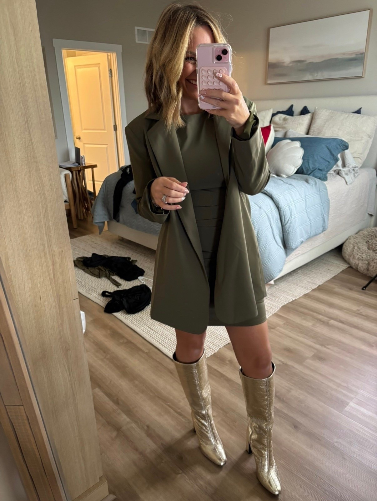 The monochrome moment I didn’t know I needed.
This olive dress + matching coat is so sleek and flattering — and the gold boots pull the whole look together. Perfect for holiday parties, winter dinners, or anytime you want to look effortlessly put-together.


Olive dress outfit • winter event look • monochrome outfit • gold knee-high boots