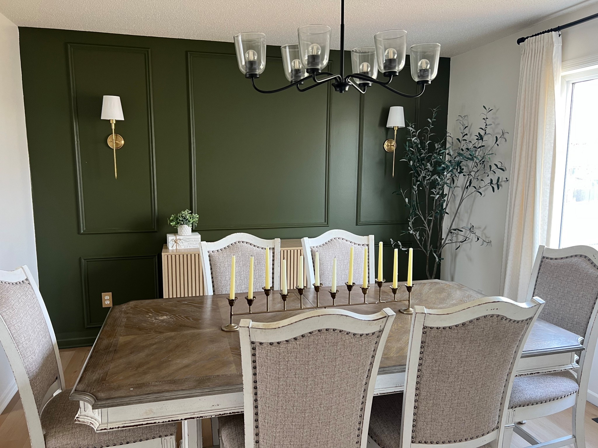 The best and easiest wall frames to put up. They come precut and ready to install! We are obsessed with this moody wall in our dining room. It’s amazing how much wall framing changes a room! 

#LTKHome #LTKdayinmylife #LTKstorytime