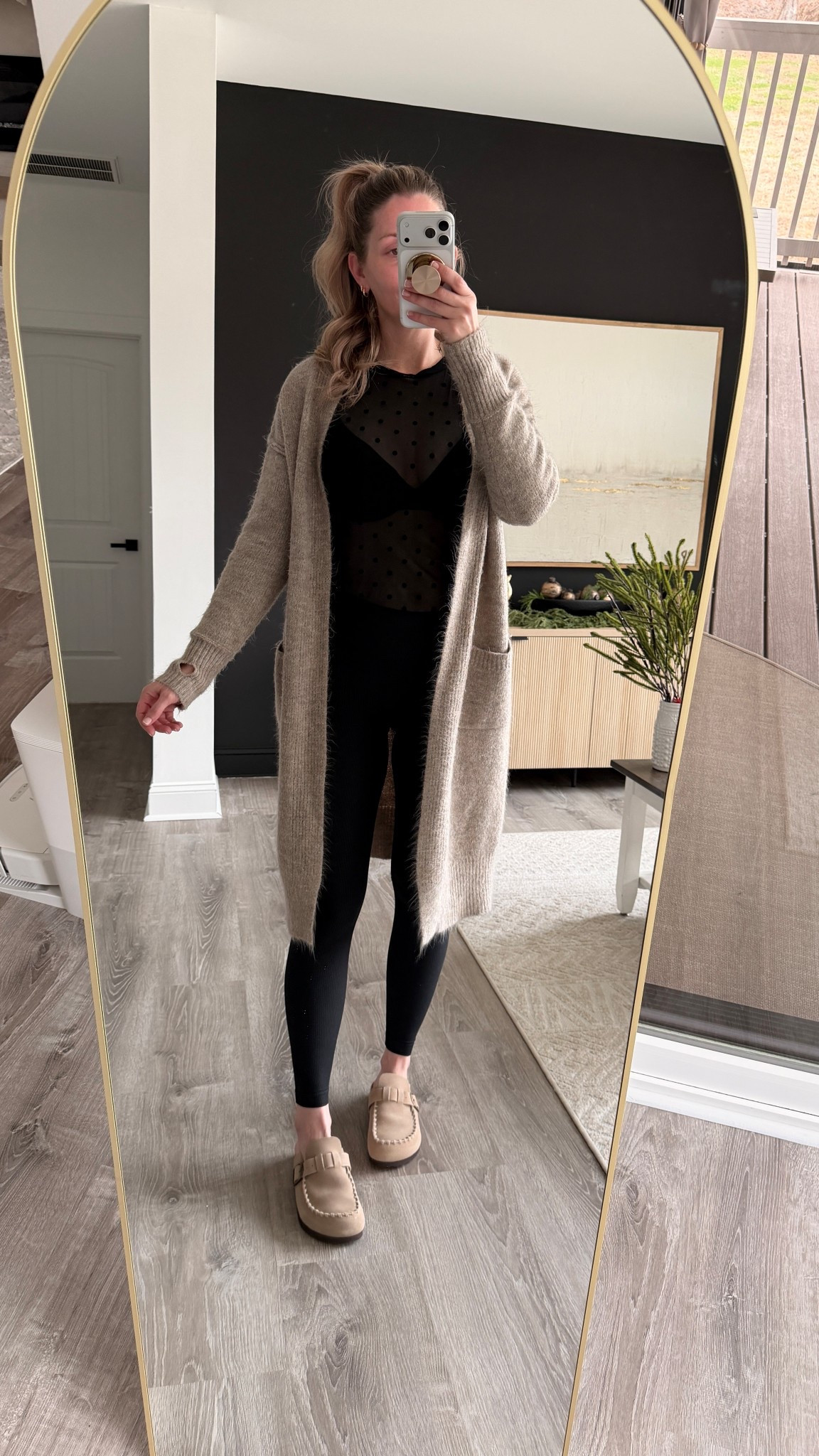 Amazon capsule wardrobe must have pieces for your closet. Look expensive without breaking the bank. Elevated all black outfit for winter. Black sheer top with polka dots paired with a black bra for subtle girlie vibe and a fuzzy knit duster cardigan to complete the look.

All black outfit idea date night outfit inspired winter outfit cozy outfit affordable outfits Amazon clothes polka dots suede clogs Birkenstock look a likes cozy winter outfit date night look styling sheet tops mesh tops see through tops Christmas party outfit #LTKHoliday 

#LTKdayinmylife #LTKootd