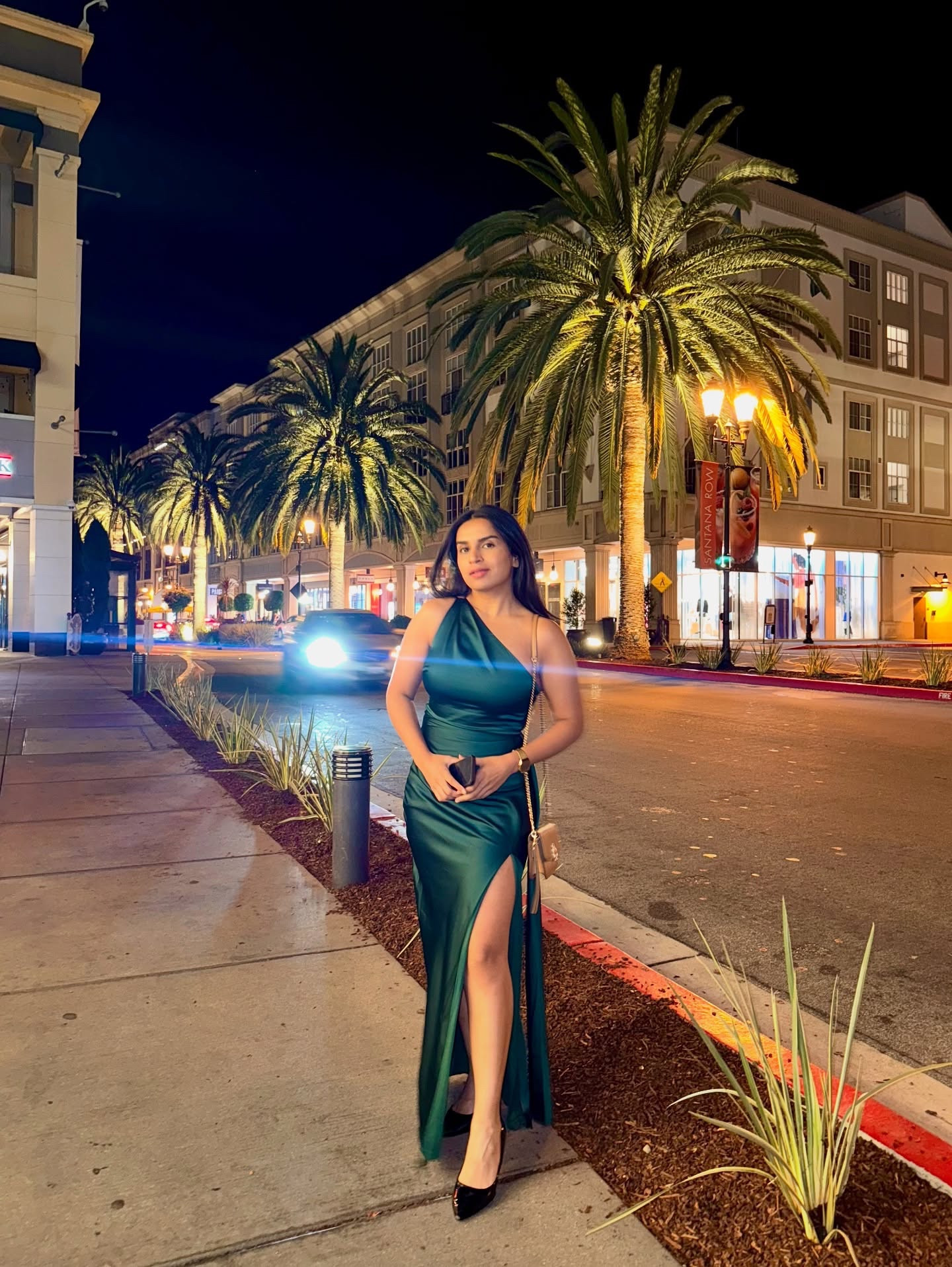 Found your perfect main character energy dress 🖤

Outfit: @lulus 

#lulusambassador #lovelulus #datenightoutfit #slitdress #ootn #satindress #traveloutfit 

[green satin slit dress date night outfit inspo]