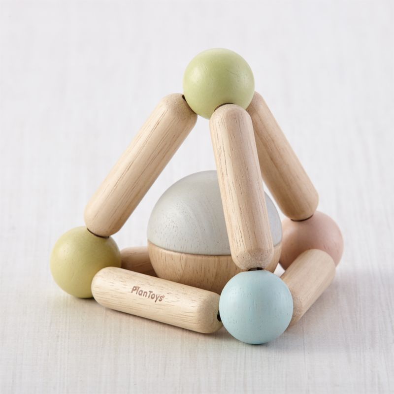 Plan Toys Pastel Triangle Clutching Toy + Reviews | Crate and Barrel | Crate & Barrel
