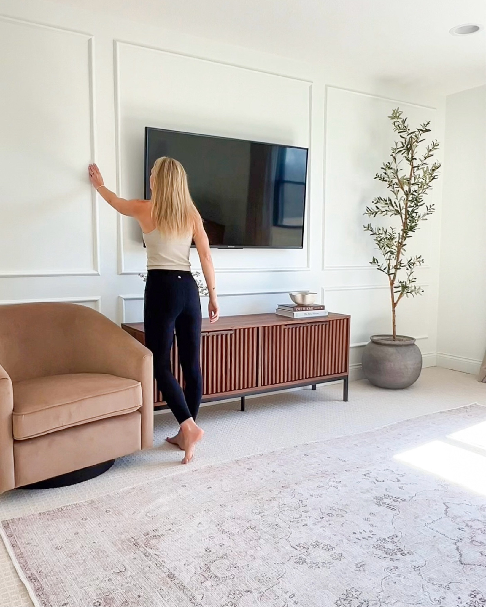 Picture Frame Molding really elevates a space and adds so much depth and texture to a plain wall! 

wainscoting, trim work, millwork, picture frame molding, redder console table , swivel chair, olive tree 

#LTKhome #LTKfindsunder100 #LTKstyletip