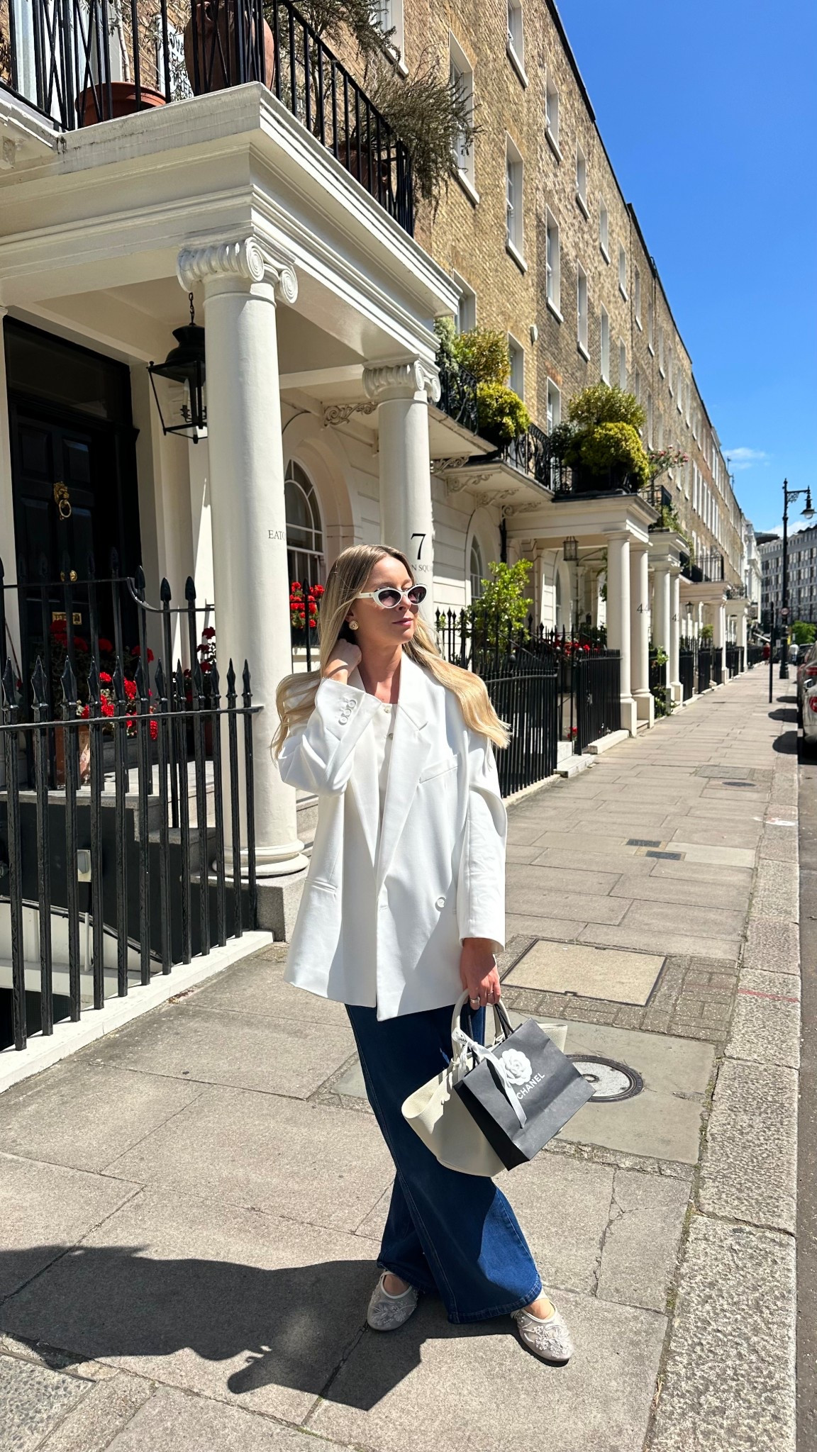 Chic spring London look, spring whites, London everyday look, oversized white blazer, Demellier Bag, Chanel sunglasses, wide leg jeans

#LTKspring #LTKluxury #LTKeurope