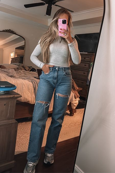 Today's vibe: Comfort meets style! Rocking a size small top from Amazon, part of a set that's both versatile and cute. Paired perfectly with size 26 curve love jeans from Abercrombie for that relaxed 90's flair. And my New Balance sneakers? They fit true to size, ensuring every step is a comfy one. 🌧️🩵

#LTKfindsunder50 #LTKstyletip