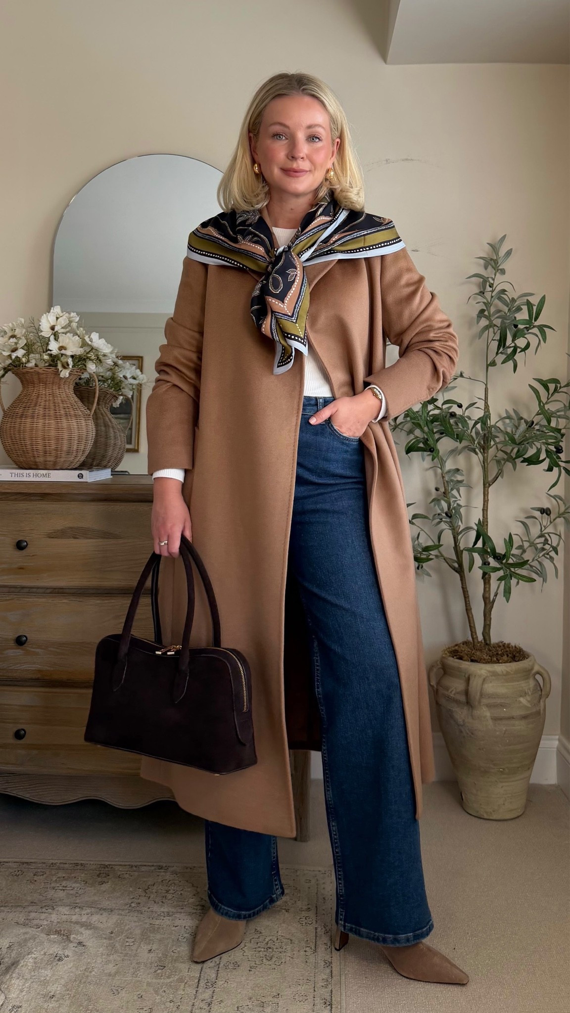 Wearing camel wool coat size 12, wide denim jeans size 10, ivory T-shirt size S, scarf, boots and suede shoulder bag🤎

#LTKuk #LTKautumn