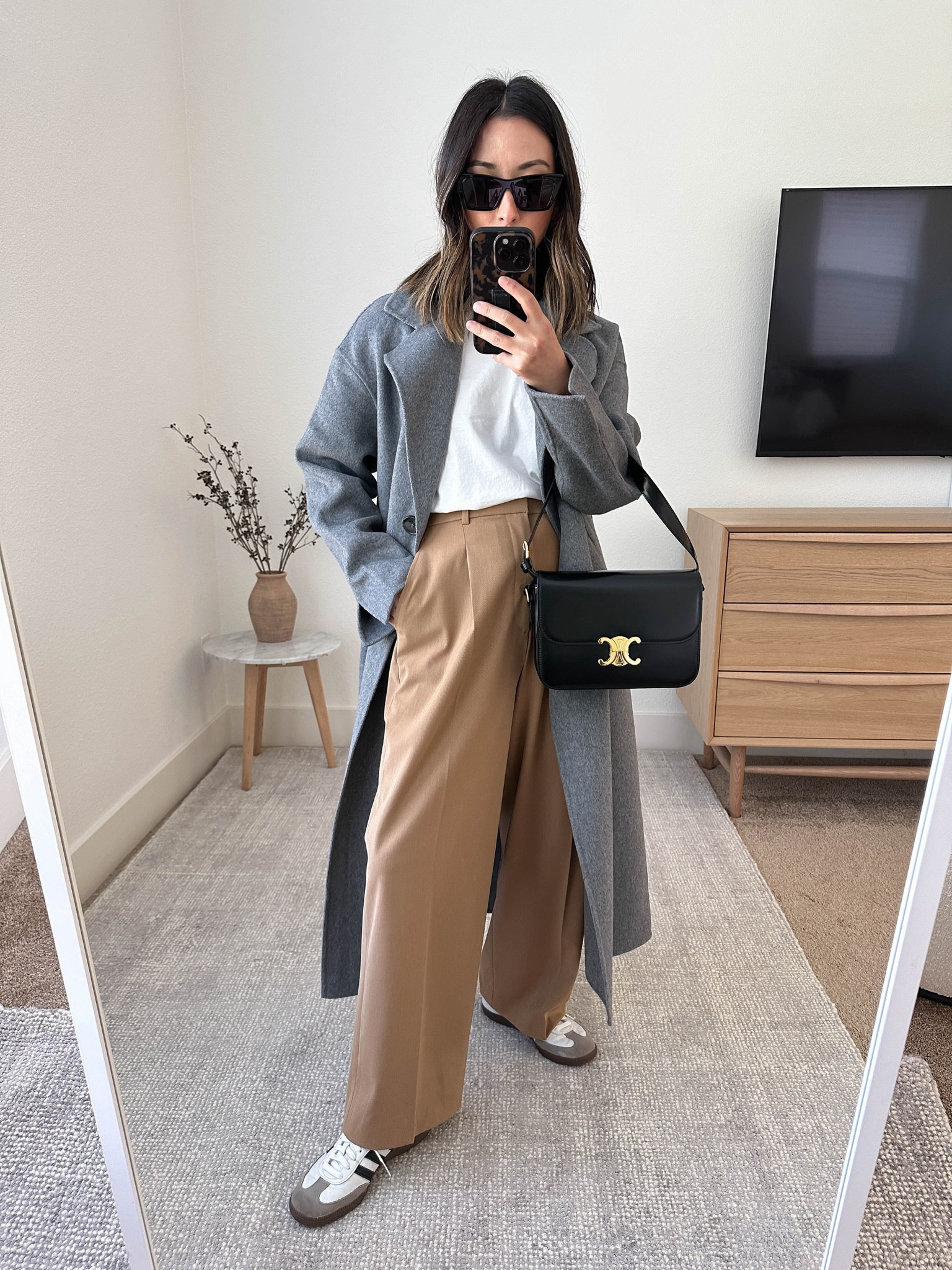 What fall bottoms work with sneakers? I find full length straight or wide trousers look so good with a lifestyle sneaker. 

Banana Republic coat petite xs
Everlane tee medium
Uniqlo trousers small 25.5" custom inseam
Adidas samba sneakers 4 mens
Celine Triomphe bag medium
YSL sunglasses

#LTKSeasonal #LTKStyleTip #LTKPetite