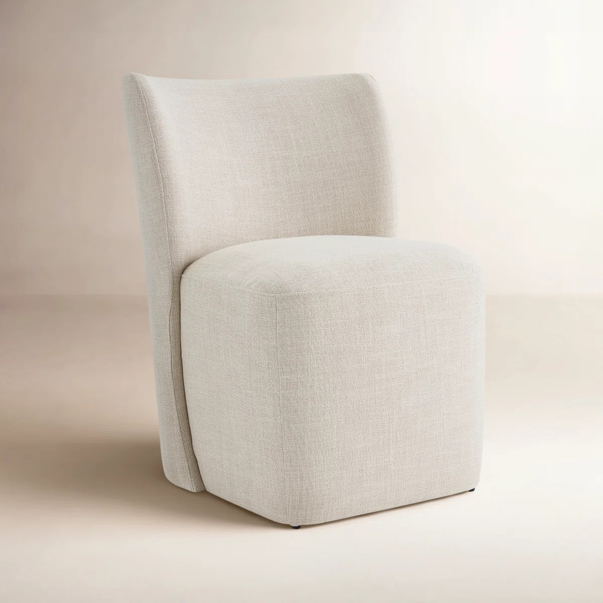 Madie Upholstered Dining Chair with Casters | Wayfair North America