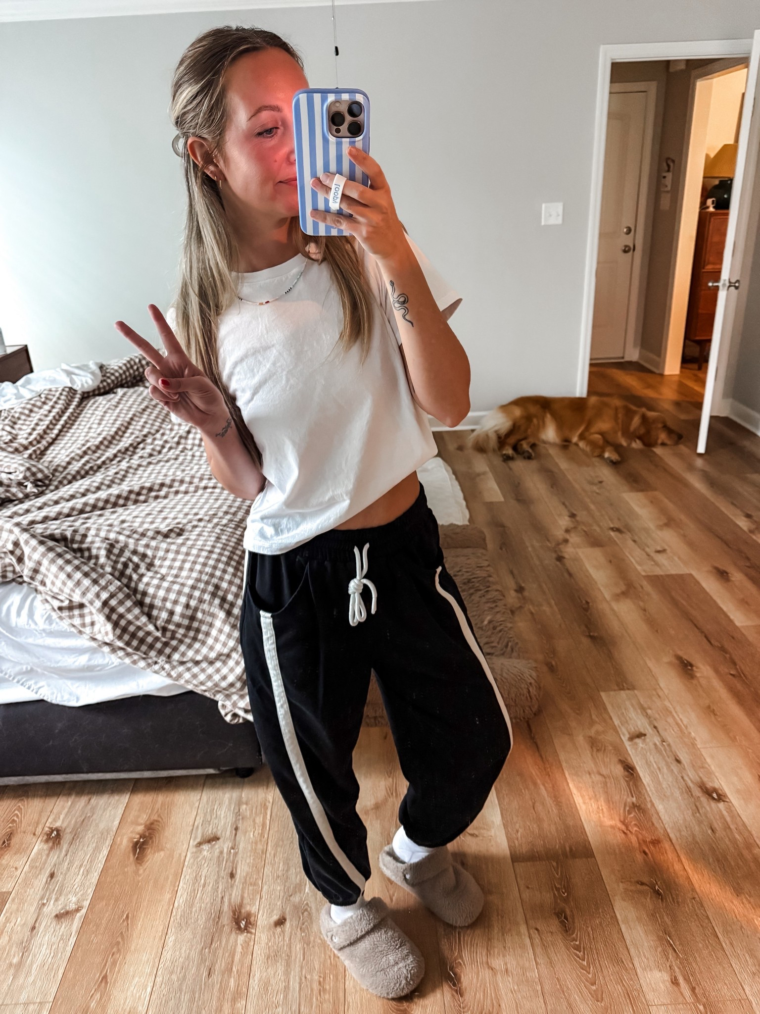 Great, Walmart boxy tea with little slits on the side and my favorite slippers ￼

#LTKmomlife #LTKdayinmylife #LTKootd