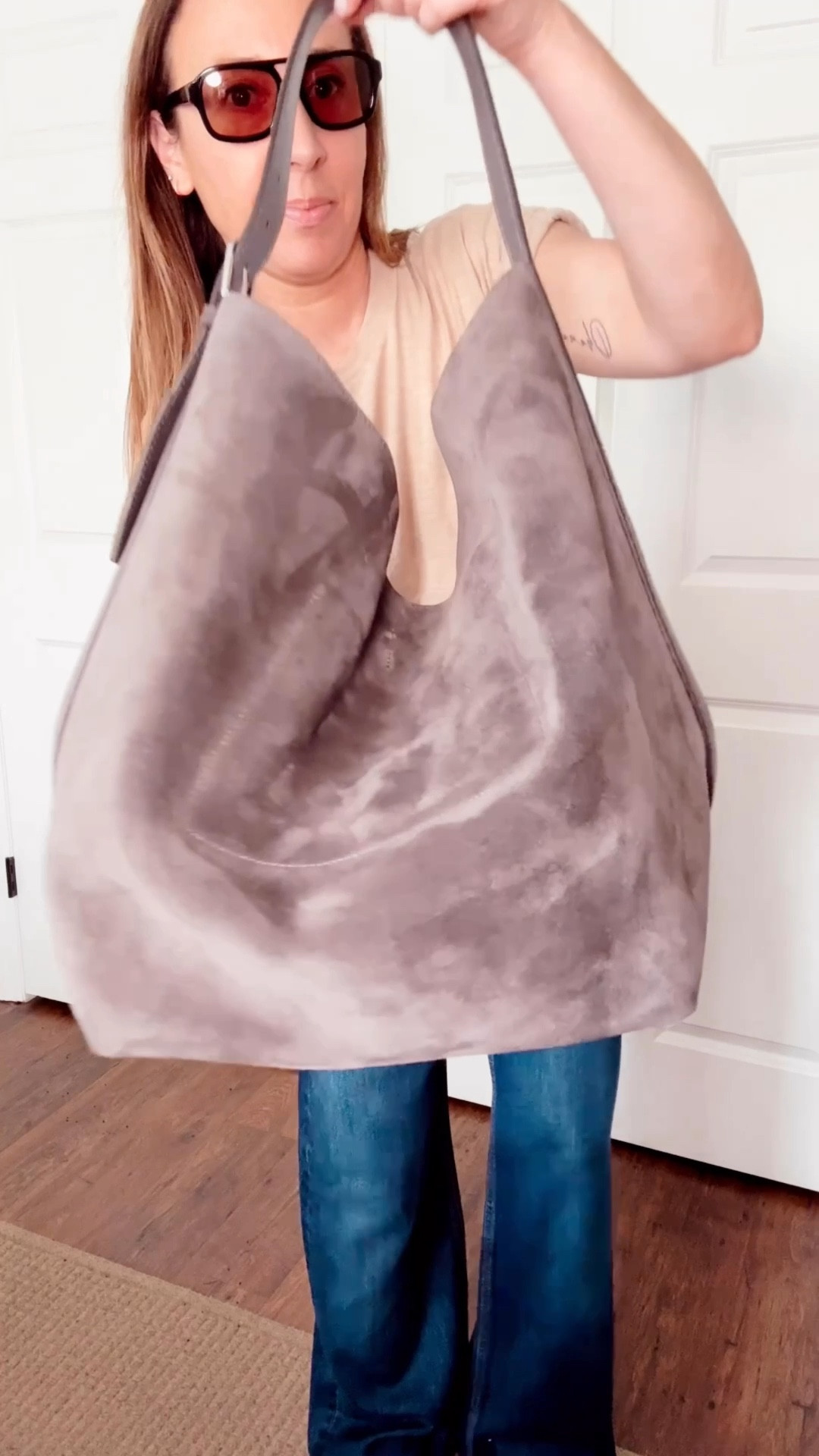 Say hello to your new go-to tote.
This suede belted bag is everything—super soft, ultra chic, and roomy enough to hold it all. I’m wearing the charcoal shade, which is the perfect dark gray-brown neutral for spring.

It elevates every outfit and goes with literally everything in my closet. Work, errands, travel… it does it all.

Linked it here in every color—this one’s a must.

#LTKBagStyle #LTKSpringStyle #LTKAccessories #LTKEverydayStyle #ChicEssentials #SpringStyle 

#LTKGiftGuide #LTKItBag #LTKSeasonal