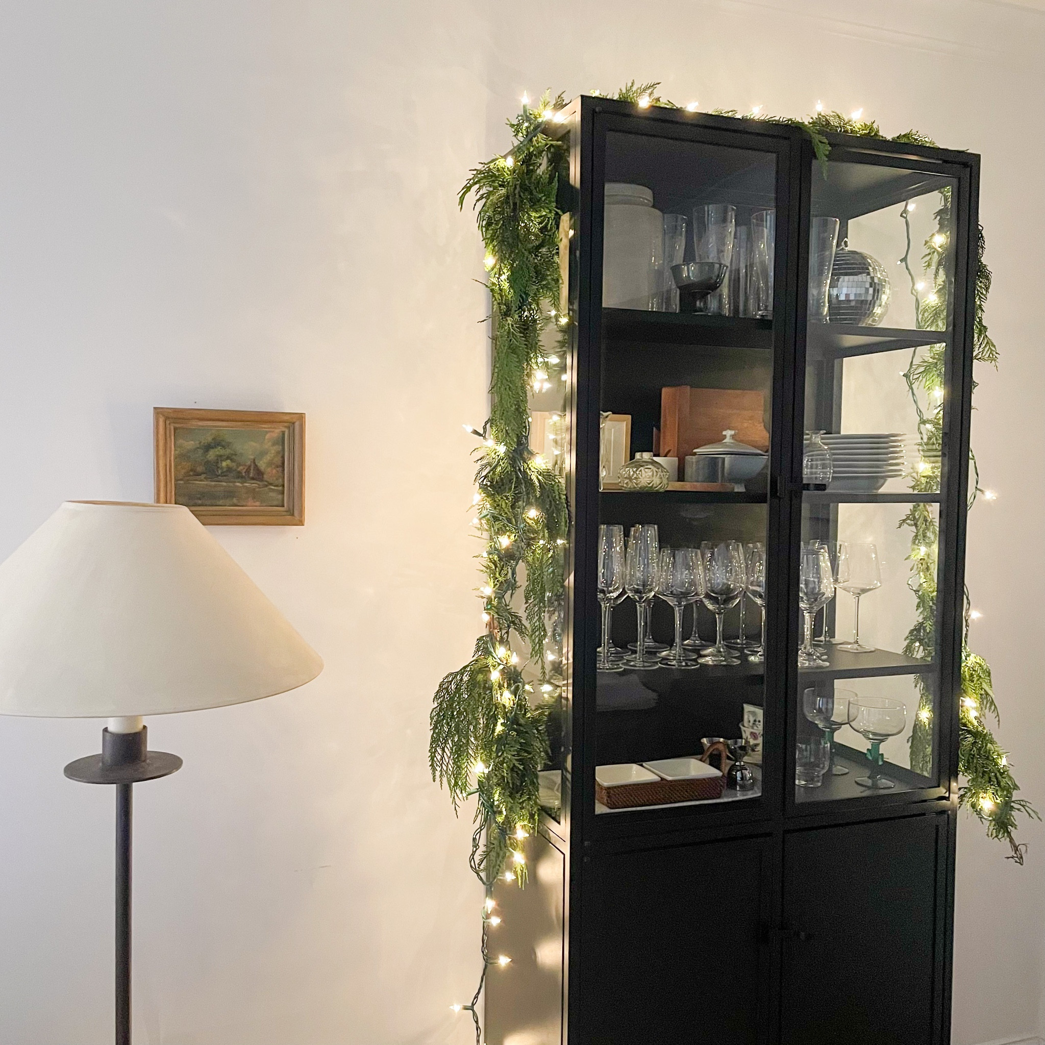 The holiday decor begins! Cedar and lights draped over a cabinet, console or chest is one of my go-tos .

#LTKHoliday #LTKSeasonal #LTKhome