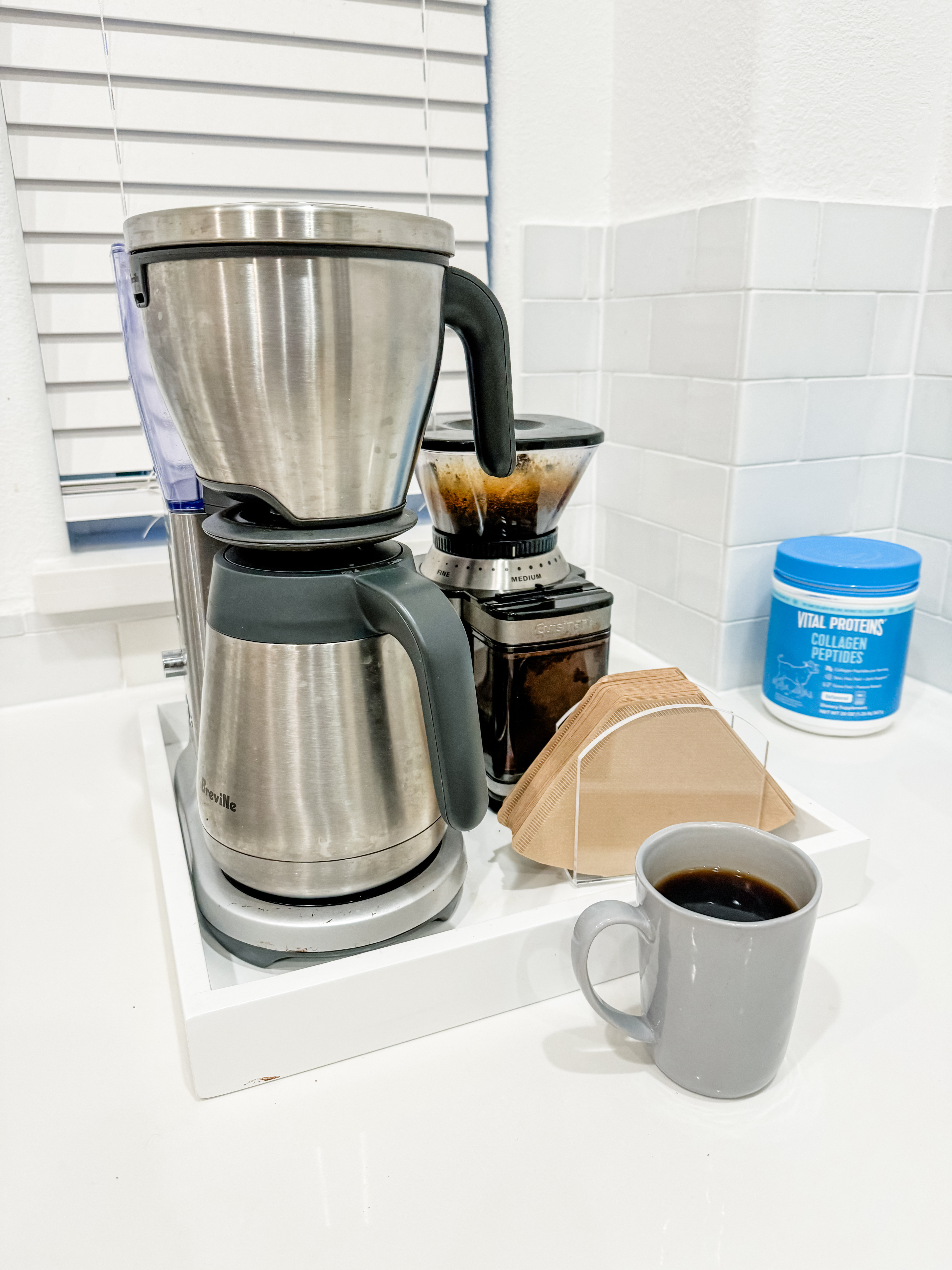 Kitchen counter organization / coffee bar / coffee maker / coffee machine / gray coffee mug / white tray / coffee bean grinder / home decor 



#LTKFindsUnder50 #LTKFindsUnder100 

#LTKHome #LTKfoodie #LTKdayinmylife