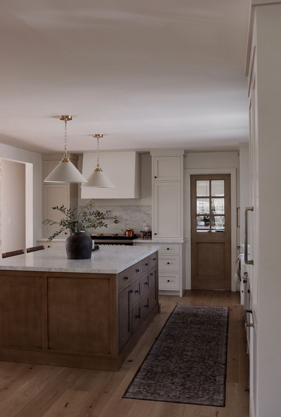 Shop our kitchen! Paint is Benjamin Moore Swiss Coffee on the walls and ceilings. Benjamin Moore Natural Cream on cabinets. White oak is a custom stain 

#LTKHome #LTKSeasonal