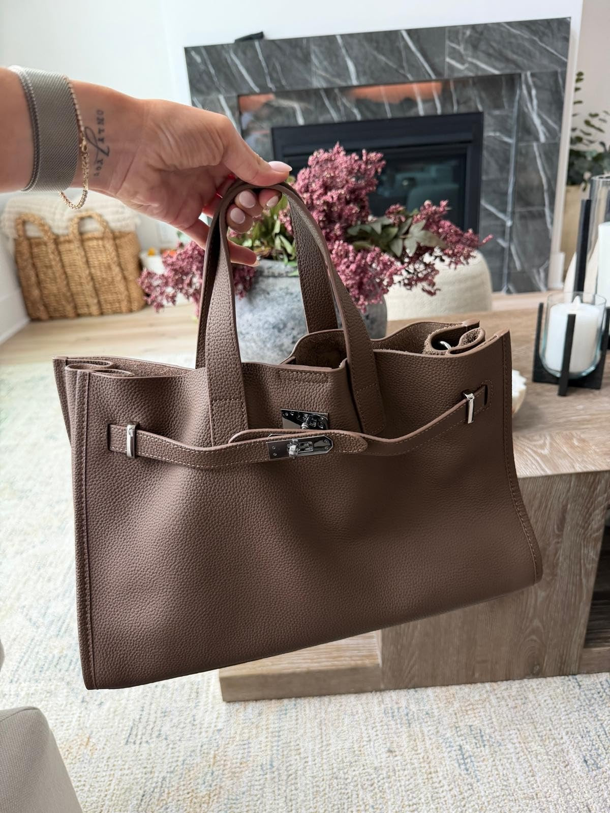 A new bag for fall, and this chocolate brown color is exactly what I was looking for. I love the structured shape, silver hardware, and roomy interior. It has that designer-inspired look and works just as well with casual denim as it does with a more polished outfit.
chocolate brown bag, brown tote bag, structured handbag, designer inspired bag, fall handbag, everyday tote, large handbag, brown purse, fall accessories, classic handbag, fall fashion, women over 40 style, annabrstyle