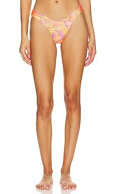 Kulani Kinis Y Cheeky Bikini Bottom in Citrus Sunrise from Revolve.com | Revolve Clothing (Global)