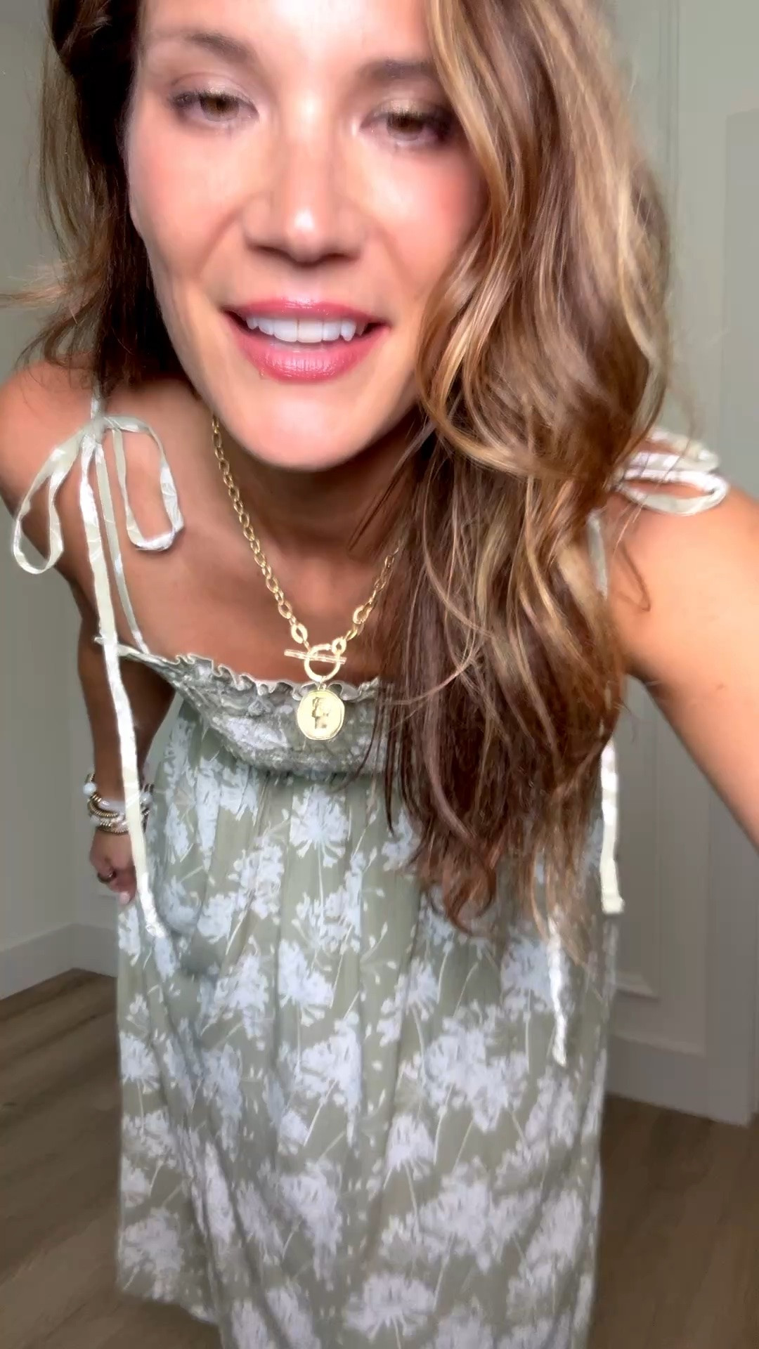This floral midi dress is one of those throw-on-and-go pieces that still looks completely put together. I love the soft sage green color, the delicate floral print, and the easy silhouette that makes it perfect for everything from brunch to vacation days.

Floral midi dress, Sage green dress, Summer dress outfit, Vacation style, Garden party dress, Casual summer fashion, Wedding guest dress, Feminine style, Comfortable dress, Resort wear, Everyday outfit inspiration, Warm weather wardrobe, StangandCo

#LTKootd #LTKSeasonal #LTKTall