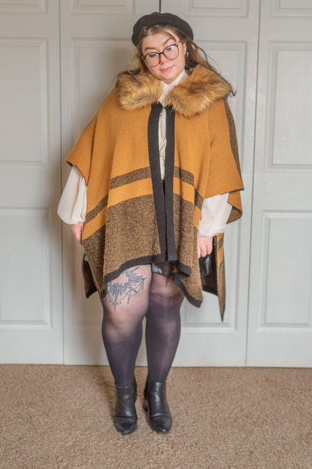 Plus size cape and faux fur Outfit 

#LTKcurves #LTKSeasonal