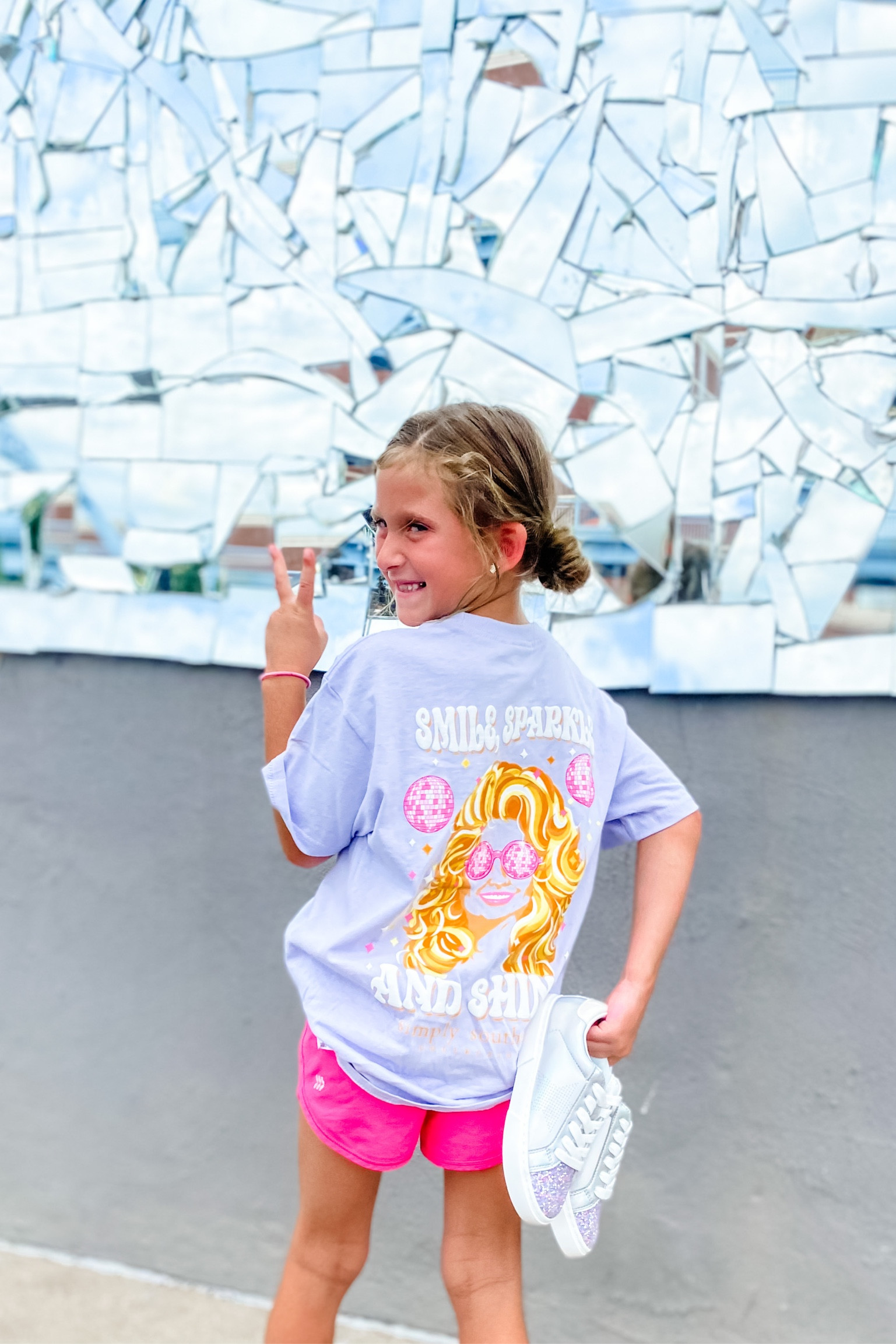 Smile sparkle & Shine ✨💗🪩
She is wearing a youth small in this Dolly inspired tee. Also available in adult sizes so you can match your mini. 

#LTKshoecrush #LTKBacktoSchool #LTKkids
