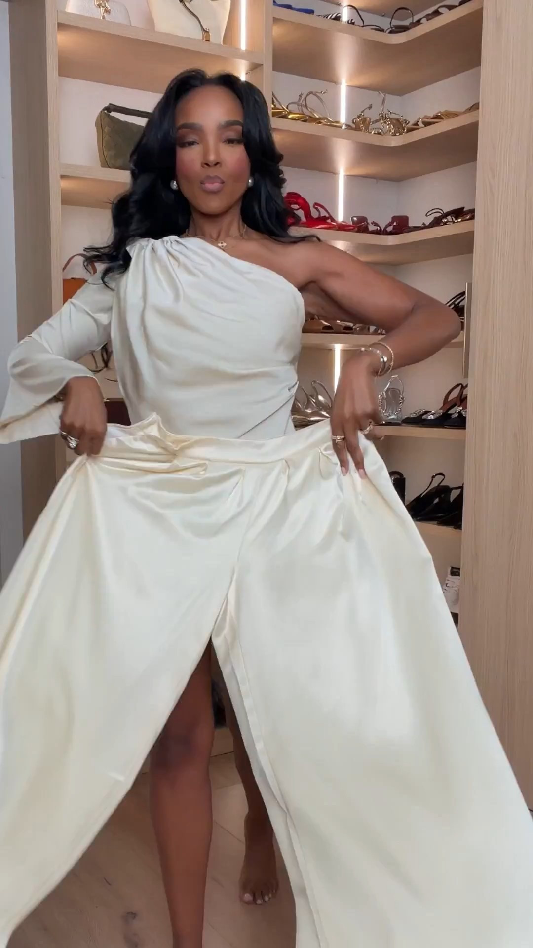 Polished neutrals done right — this silky cream set is the definition of effortless elegance. The draped one-shoulder top paired with flowy satin pants creates a flattering, elevated silhouette that moves beautifully. Styled multiple ways, this is one of those pieces where the cost per wear keeps dropping.

Perfect for date night, holiday dinners, cocktail parties, or elevated evening events.

📏 Sizing:
Wearing size Small  
Pants: 27 Long  

📐 Measurements:
5'4" | 138 lbs | 34D bust | 27" waist | 40" hips  

Save this post for a chic neutral outfit that works year-round. Satin matching set, elegant evening outfit, one-shoulder top styling, wide leg satin pants, neutral dressy outfit, elevated minimal look, holiday outfit idea, cocktail attire inspiration.

Follow me on Instagram and YouTube @kirasfashionfinds

