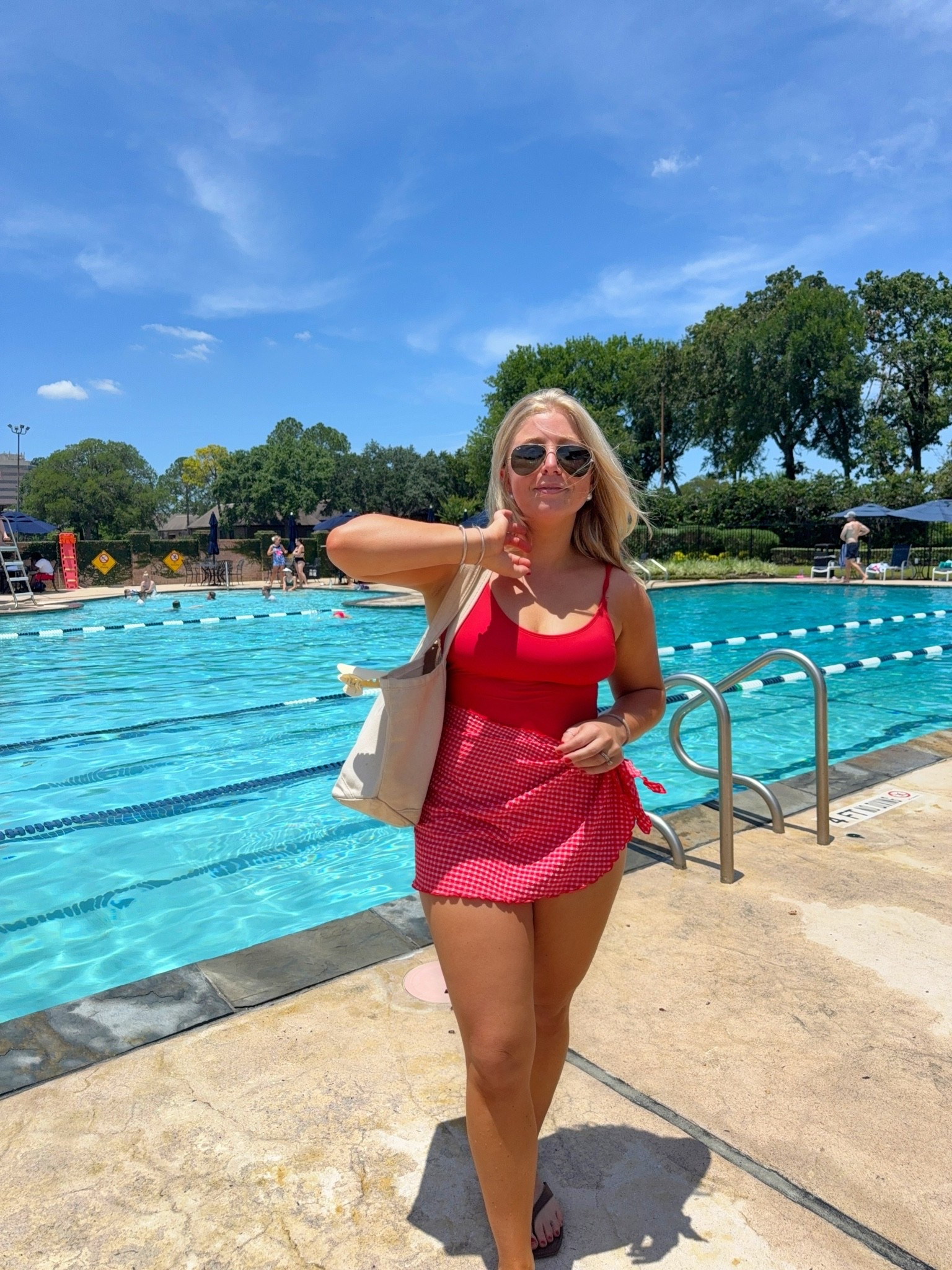 Red one piece bikini + coverup. 

Sizing: small in the swimsuit and small in the wrap! #ltkswim #ltkmom