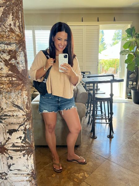 Wearing all of my favorite summer items this weekend. My slouchy cotton 3/4 sleeve top is on sale for $11.98, available in select sizes and colors. My distressed denim shorts are also on sale. 

#LTKunder50 #LTKSeasonal #LTKsalealert