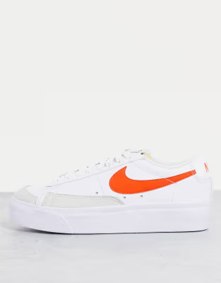 Nike Blazer Low Platform sneakers in white/orange | ASOS | ASOS (Global)