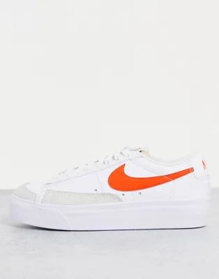 Nike Blazer Low Platform sneakers in white/orange | ASOS | ASOS (Global)