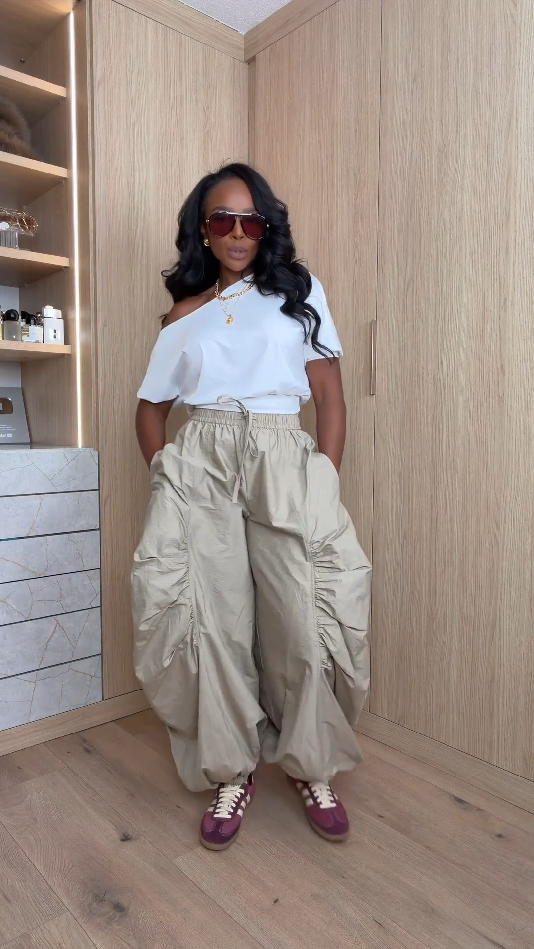 Scroll to shop! ✨ Everything from this look is linked below. 👇🏽

COMFY but still giving a LOOK 🤎 These oversized parachute pants paired with an off-the-shoulder top + sneakers are the definition of elevated casual. The proportions make this feel so much more styled than your typical everyday outfit.

beige parachute pants, oversized cargo pants women, off shoulder white top, white asymmetrical top, Adidas sneaker outfit, burgundy sneakers women, casual street style outfit, elevated casual outfit, relaxed pants outfit, sporty chic outfit, neutral fall outfit, trendy mom outfit, petite street style, fall sneaker outfit, kirasfashionfinds

Wearing: Size Small | 5’4” | 140 lbs | 34D-27-40

Download the FREE LTK app & follow @kirasfashionfinds

#LTKPetite #LTKSeasonal #LTKShoeCrush