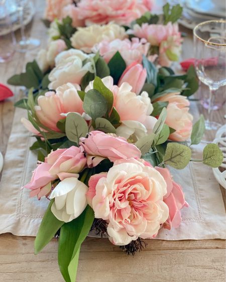 Sharing a close look at this beautiful Easter centerpiece I created. I started with an artificial garland and then I filled in any holes and areas that looked uneven using faux eucalyptus stems and faux tulips and peonies. Head to my blog for more pictures : Martha Stewart Collection Spring and Easter Tablescape.

#LTKhome #LTKSeasonal #LTKfamily