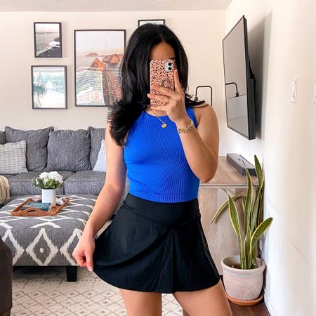 get 15% off this activewear skirt with code: JESSM15 💕 i’m wearing this skirt in a size medium and it fits true to size. the skirt has built-in shorts with pockets. the length isn’t too short (i’m 5’3”). the fabric is buttery soft, stretchy, opaque, and cooling. it’s available in several other colors. // i’m wearing this top in a size large and it fits true to size. i sized up for a more comfortable fit. 

#LTKStyleTip #LTKActive #LTKSaleAlert