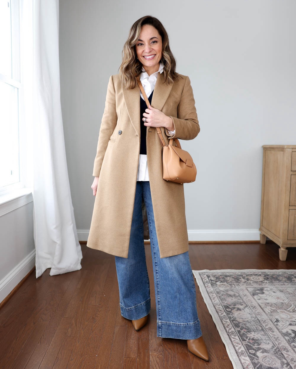 Three petite-friendly coats for early Spring!

Outfit 1:
Jeans (J.Crew): Petite 23 - size down 9" rise and 29" inseam in petite
Button-down top (J.Crew): Petite XXS
Cropped Cashmere Sweater(J.Crew): XXS
Coat (J.Crew): Petite 00 (my coat is from a previous season, but I have tested the fit of the current one linked)
Boots (J.Crew): sold out in the exact color I'm wearing. 
Bag (Polene): unable to link

Outfit 2:
Coat (J.Crew): petite 00 - runs slim through the sleeves 
Jeans (J.Crew): petite 23 size down  I did not hem these jeans, showing how they fit from the store, they have a 29” inseam in petite and my pair shrunk in the wash to 28” :)
Sweater (J.Crew): xxs 
Bag: Polene - unable to link 
Boots are linked for reference but they’re sold out in the exact color I’m wearing 

Outfit 3:
Coat (Ann Taylor): Petite XXS 
Pleated Skirt (Aritzia): XS
Heels (Sam Edelman): tts
Tote (Quince)
Tan Sweater (J.Crew): XXS

My measurements for reference: 4’10” 105lbs bust, waist, hips 32”, 24”, 35” size 5 shoe. 25” inseam measurement to my ankle bone. 

#LTKSeasonal #LTKStyleTip #LTKPetite